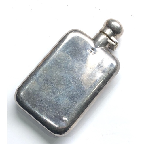 129 - Vintage silver hip flask Birmingham silver hallmarks measures approx. 13.5cm by 7.1cm small dents sh... 