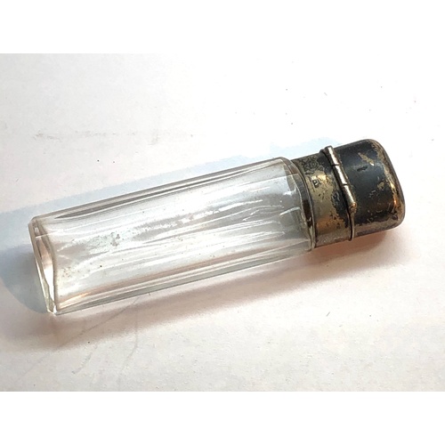 142 - antique silver top perfume bottle measures approx 7cm tall with original glass stopper in good uncle... 