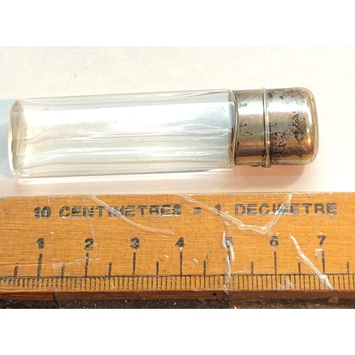 142 - antique silver top perfume bottle measures approx 7cm tall with original glass stopper in good uncle... 