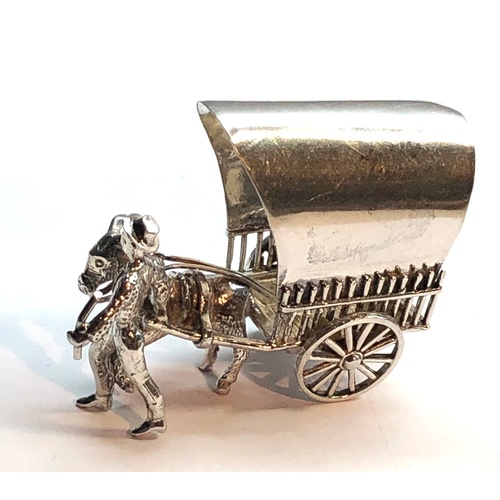 145 - Silver miniature man with donkey pulling a cart measures approx 5cm wide high small dutch silver hal... 
