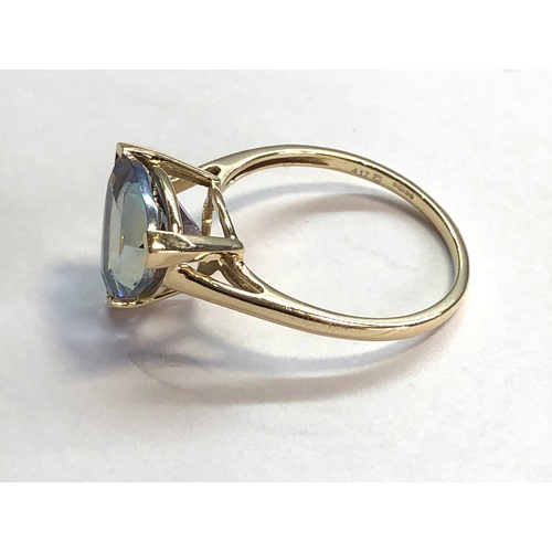 134 - 10k Gold stone set ring weight 2.4 blue Irridescent stone, as  shown good condition, ring size O