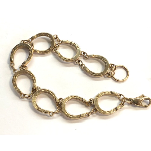 139 - Vintage 9ct gold horse shoe bracelet, measures approx 19cm long 14mm wide weight approx 16g, good as... 