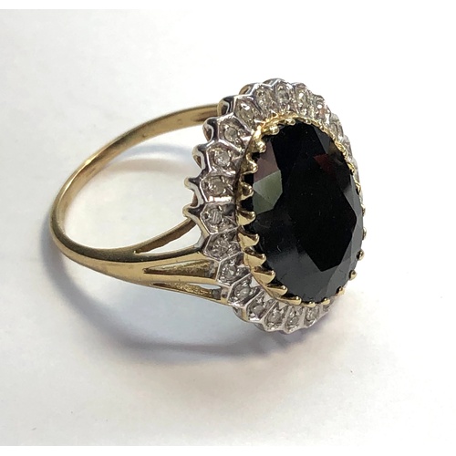 137 - Large Diamond and Sapphire 9ct gold dress ring large dark blue coloured stone set with small Diamond... 