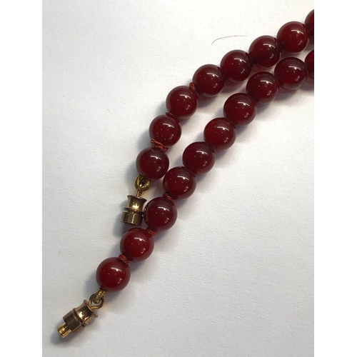 157 - Antique round cherry amber / bakelite bead necklace graduated round beads largest measures approx 14... 