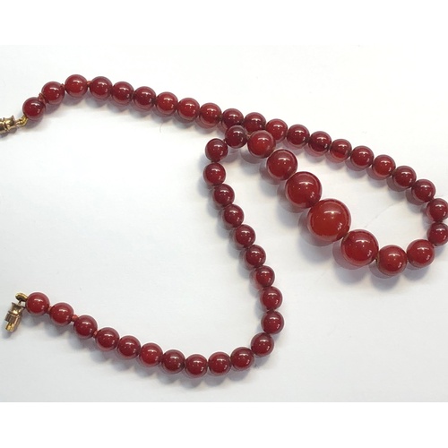 157 - Antique round cherry amber / bakelite bead necklace graduated round beads largest measures approx 14... 