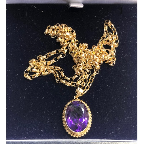 154 - 9ct Gold and Amethyst set pendant with gold chain Amethyst stone measures approx 17mm by 12mm set on... 