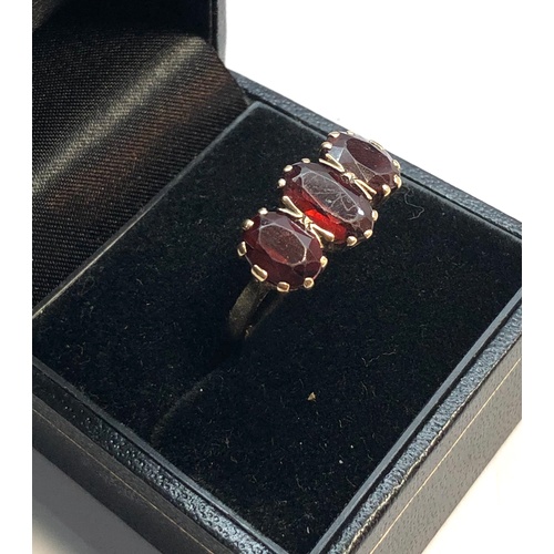 140 - Vintage 9ct gold garnet dress ring weight 4.1g surface marks to garnets, as shown