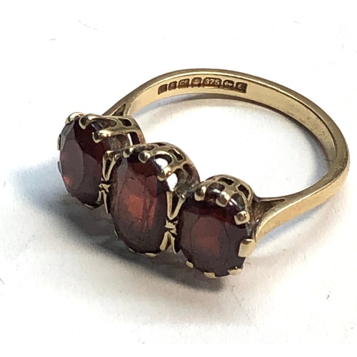 140 - Vintage 9ct gold garnet dress ring weight 4.1g surface marks to garnets, as shown