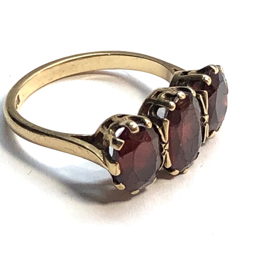 140 - Vintage 9ct gold garnet dress ring weight 4.1g surface marks to garnets, as shown