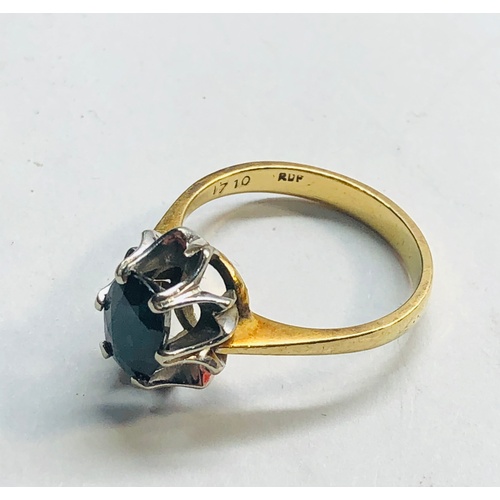 153 - 18ct gold sapphire ring sapphire measures approx 7.5mm by 6mm weight 4.3g good as shown condition