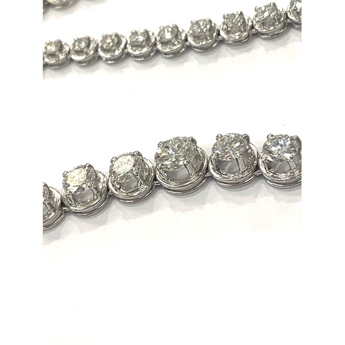 171 - Fine graduated diamond necklet, consisting of 75 round brilliant cut diamonds, measuring from 2.9mm ... 