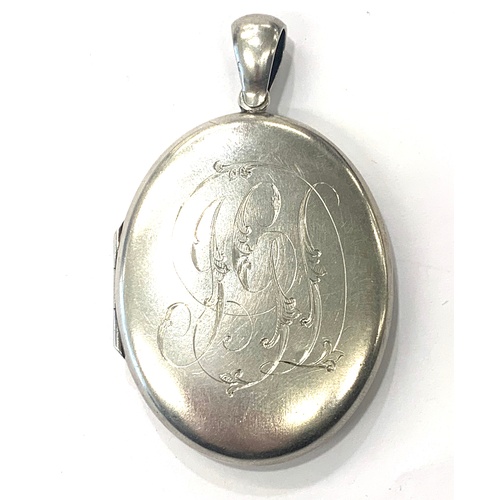 174 - Victorian Chinese silver embossed scene locket, approximate size 52mm by 41mm not including pedant c... 