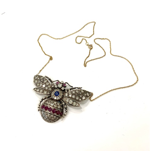 186 - Diamond, ruby, sapphire insect necklace, gold back silver front. Size is approx 50mm by 33mm, good o... 