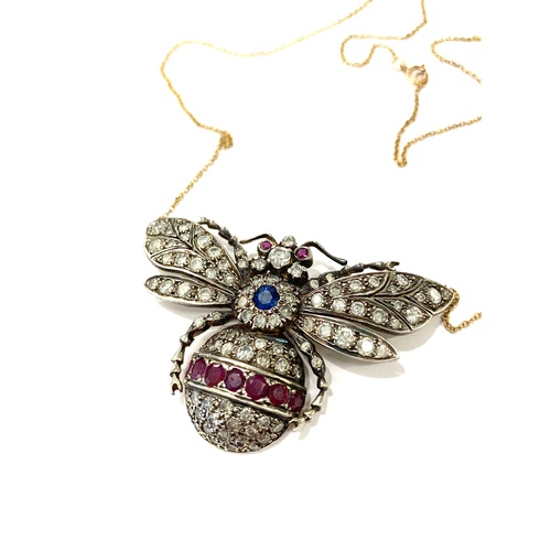 186 - Diamond, ruby, sapphire insect necklace, gold back silver front. Size is approx 50mm by 33mm, good o... 