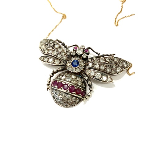 186 - Diamond, ruby, sapphire insect necklace, gold back silver front. Size is approx 50mm by 33mm, good o... 