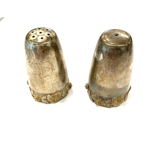 72 - Hallmarked ornate modernist salt and pepper pots, London silver hallmarks, makers mark HOL, approxim... 