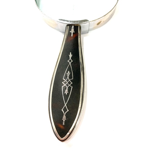 83 - Silver and tortoiseshell magnifying glass, in good antique condition