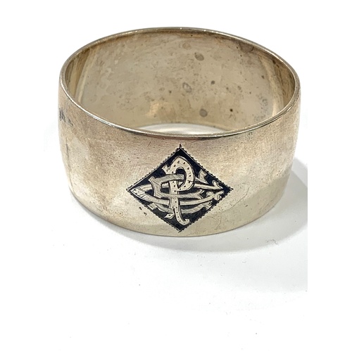 85 - Silver Persian Neillo signed napkin ring, approximate total weight: 45g.