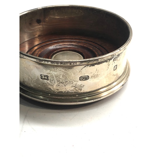 68 - small silver wine coaster measures approx 9.3cm dia