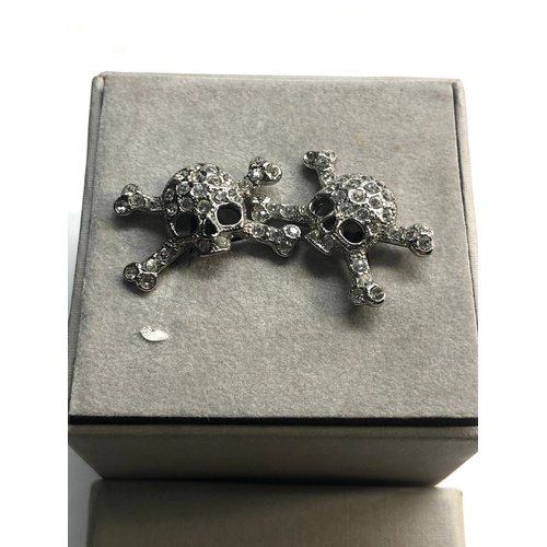 201 - boxed designer vivienne westwood skull cufflinks