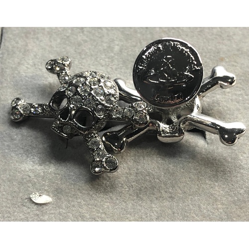 201 - boxed designer vivienne westwood skull cufflinks