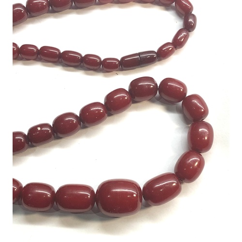 184 - large barrel shaped cherry amber / bakelite bead necklace graduated beads with internal streaking la... 