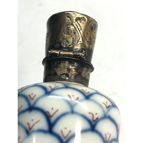 116 - antique silver top perfume bottle in uncleaned condition measures approx 8.5 cm dutch sword silver h... 