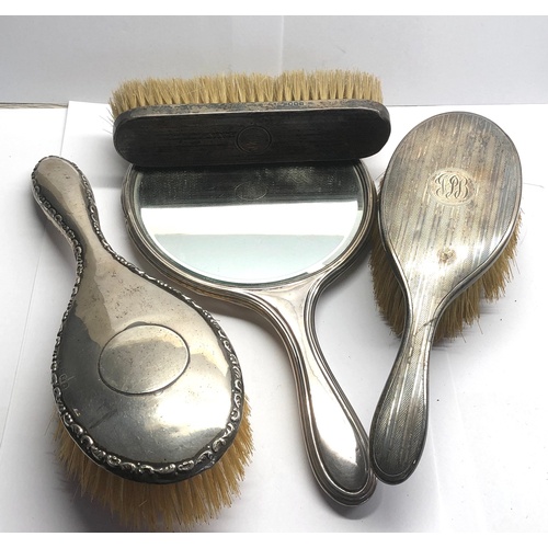 108 - Antique silver backed mirror and brushes