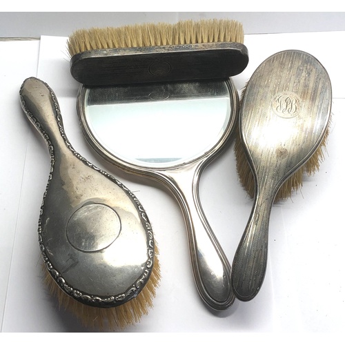 108 - Antique silver backed mirror and brushes