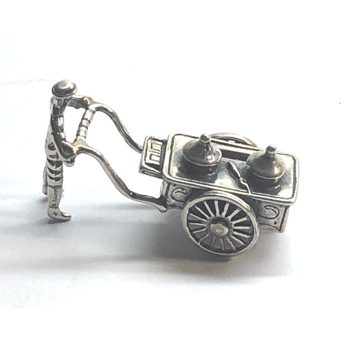 116 - Dutch silver miniature man pushing cart