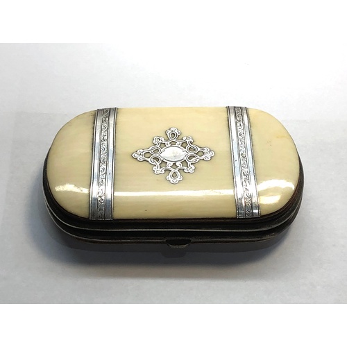 128 - Antique silver mounted ivory purse fitted interior measures approx 8.6cm by 5.3cm good condition age... 