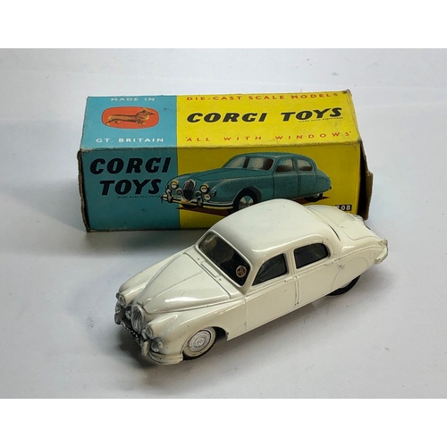 447 - Boxed Corgi 208 Jaguar 2.4 litre saloon in good condition please see images for condition