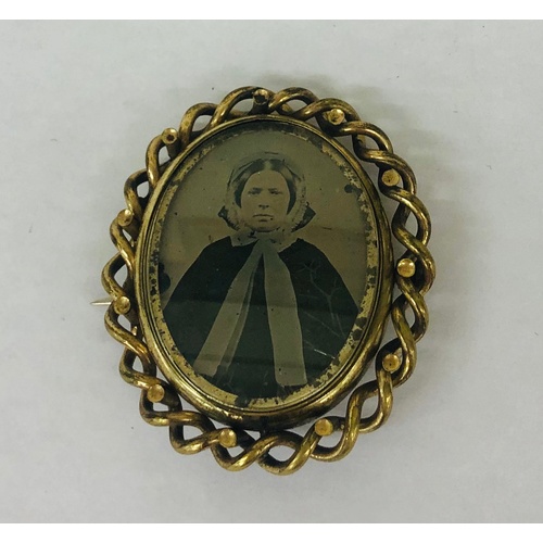 375 - Gold tone double sided picture brooch