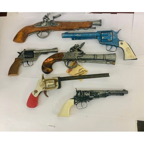 12 - 6 vintage toy guns