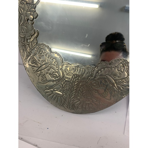 16 - Ornate metal wall mirror, small damage which can be seen in the images, approximate measurements: He... 