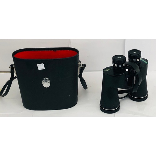 26 - Pair of cased Chinon binoculars