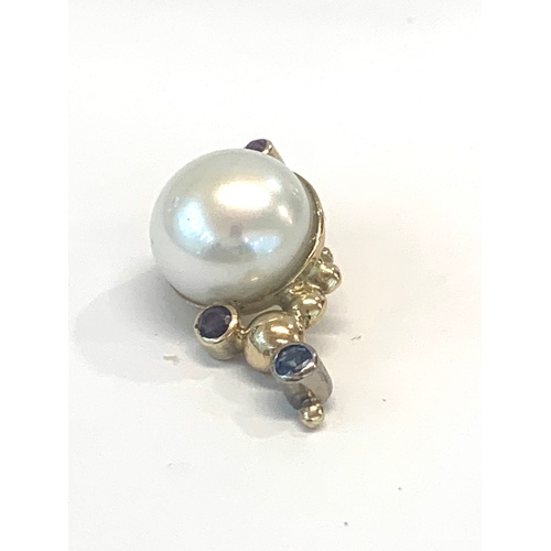 145 - Continental high carat gold pearl and gem set pendant not hallmarked but tested as 14ct gold measure... 