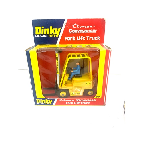 469 - Dinky Die cast, McLaren M8A Can AM model 223, Fork lift truck model 404 both in original boxes