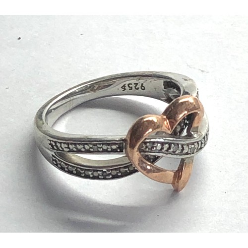 143 - Silver and diamond ring