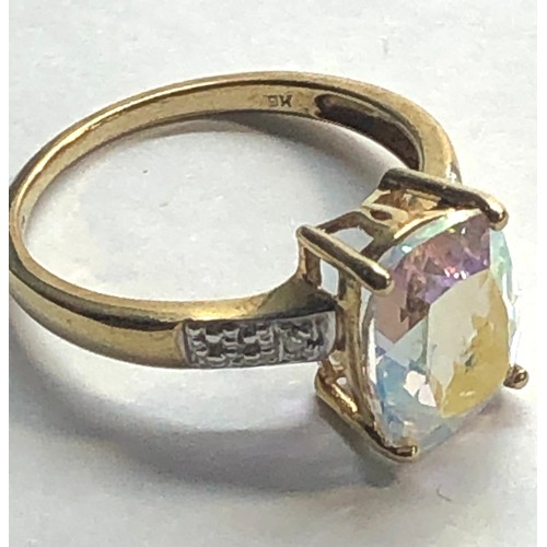 194 - 9ct gold topaz & diamond ring weight 2.7 size O