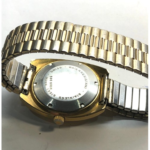 317 - Vintage gents Rotary automatic watch is ticking please see images for condition no warranty given