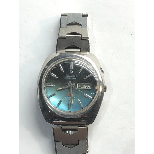 328 - Vintage gents Ricoh automatic wristwatch the watch is ticking please see images for condition no war... 