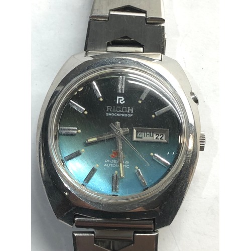 328 - Vintage gents Ricoh automatic wristwatch the watch is ticking please see images for condition no war... 