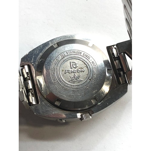 328 - Vintage gents Ricoh automatic wristwatch the watch is ticking please see images for condition no war... 