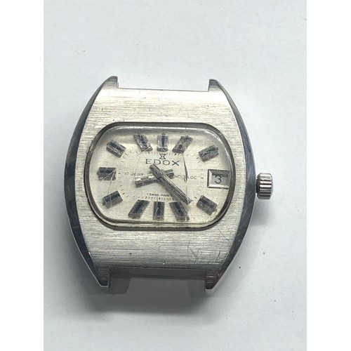 334 - Vintage gents Edox wristwatch the watch is ticking but no warranty given glass cracked missing lugs ... 