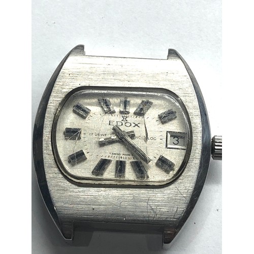 334 - Vintage gents Edox wristwatch the watch is ticking but no warranty given glass cracked missing lugs ... 