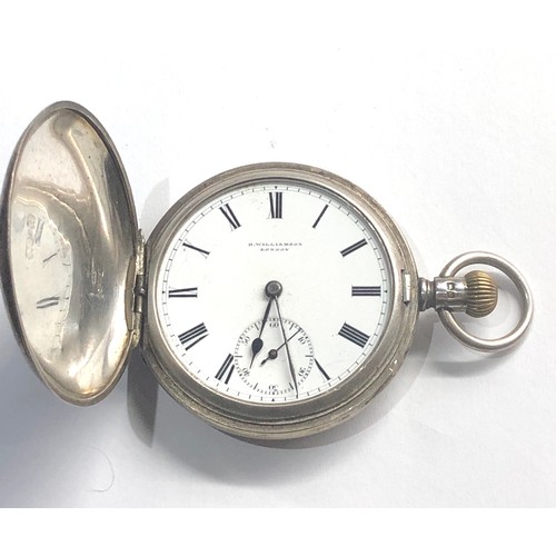 302 - Antique silver full hunter pocket watch h.williamson 
london watch winds and ticks missing glassbut ... 