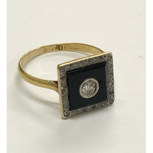 213 - Art deco 18ct diamond ring central diamond set in black stone with small rose diamonds around weight... 