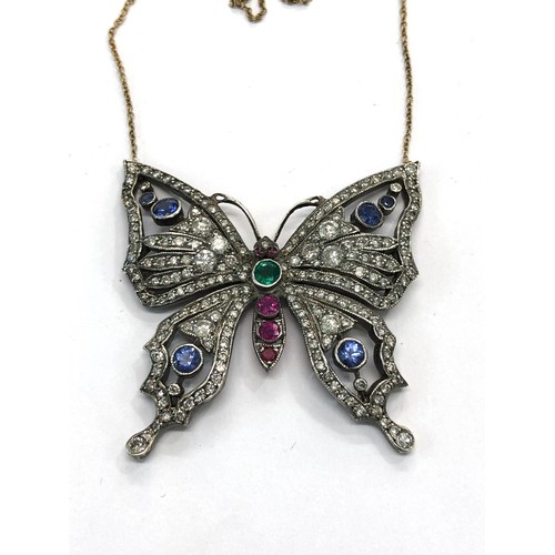 223 - Large diamond emerald ruby and sapphire butterfly necklace gold back silver front measures approx 45... 