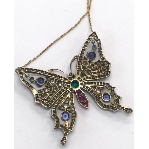 223 - Large diamond emerald ruby and sapphire butterfly necklace gold back silver front measures approx 45... 